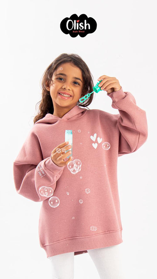 Oversized top in printed sweatshirt